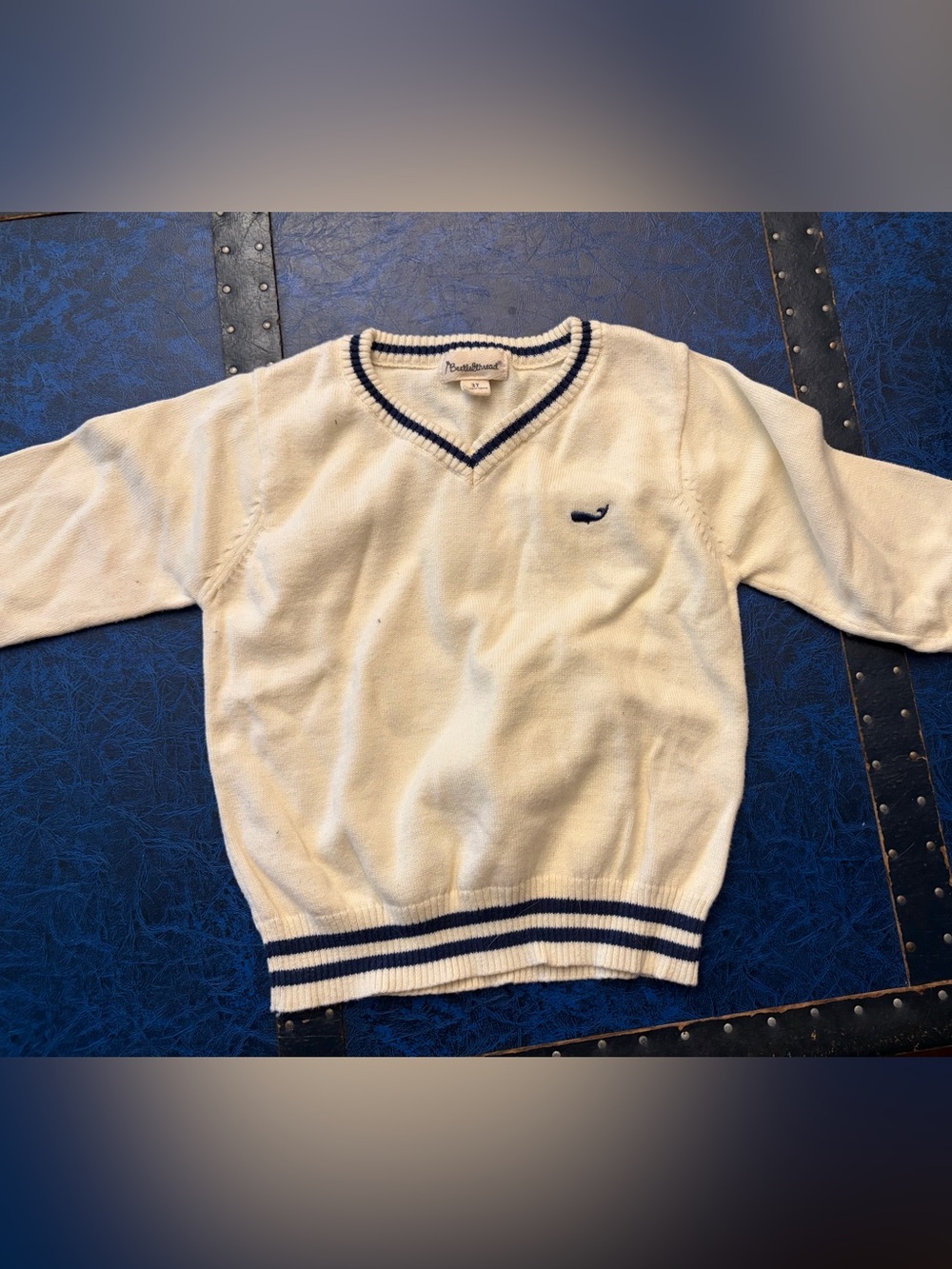 Cream sweater with navy trim